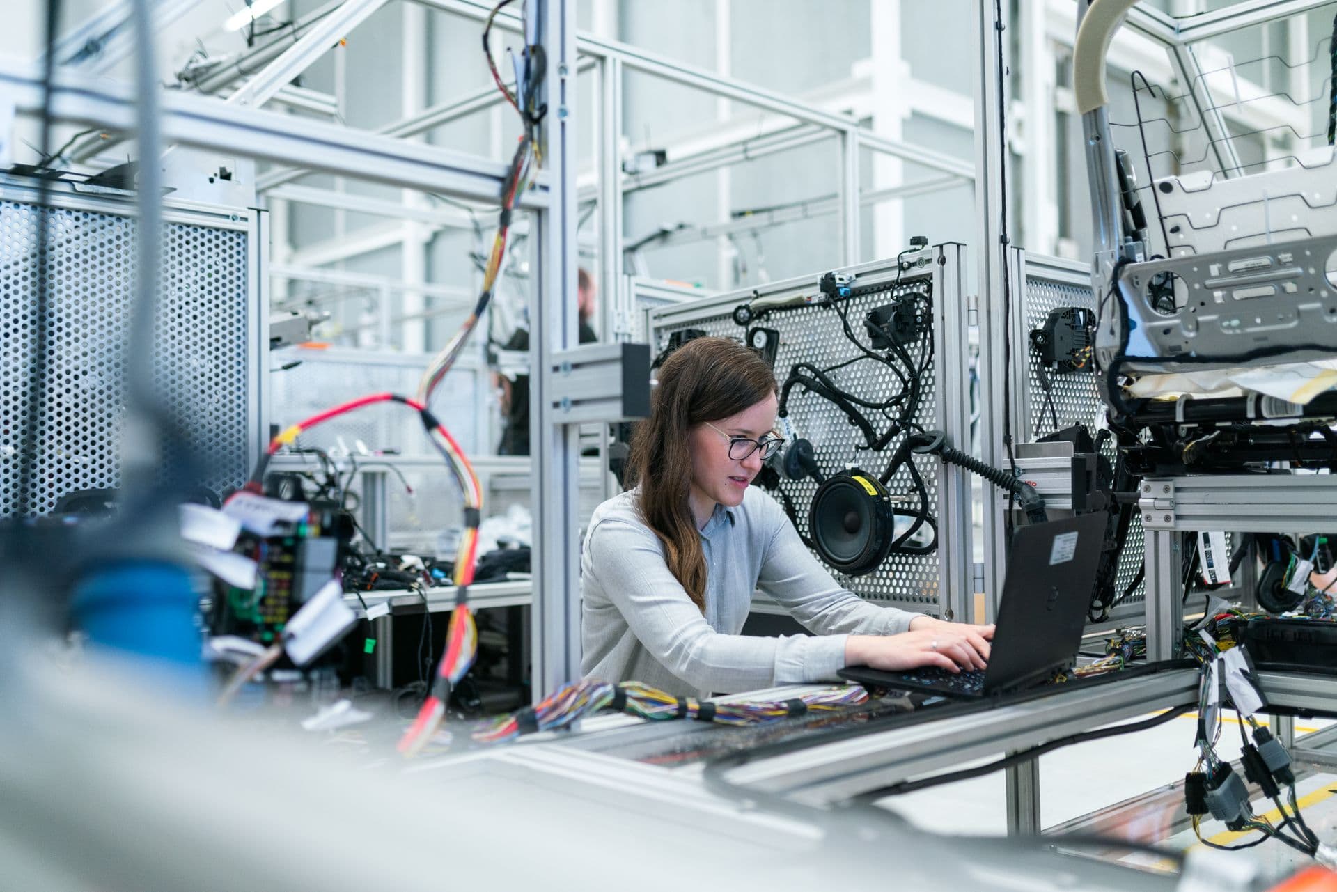 Engineer reviewing electrical single line diagrams and instrument cable tray layouts